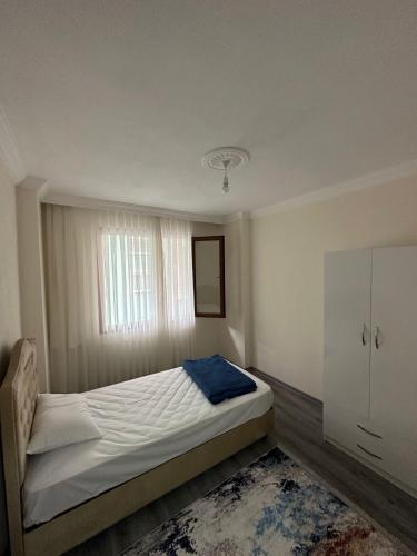 Postel nebo postele na pokoji v ubytování Trabzon - Rize Elit Apart