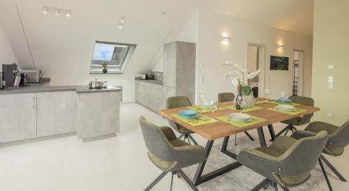 Η κουζίνα ή μικρή κουζίνα στο SweetHome - Poing Apartments