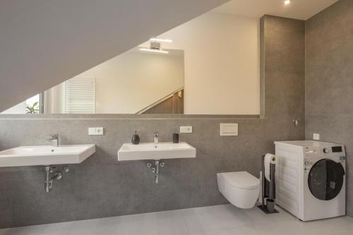 Ένα μπάνιο στο SweetHome - Poing Apartments