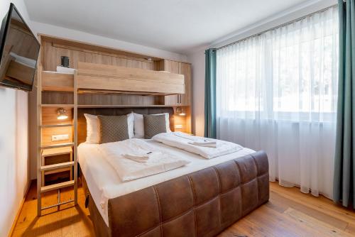 Posteľ alebo postele v izbe v ubytovaní Appartement Pegasus Top 4