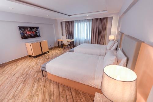 The Row Residential Hotelにあるベッド