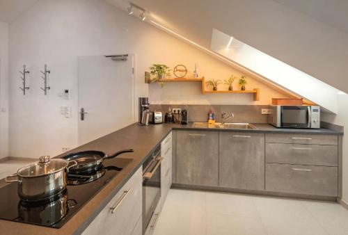 Η κουζίνα ή μικρή κουζίνα στο SweetHome - Poing Apartments