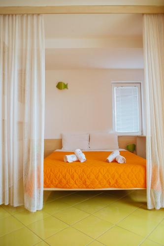 Cama o camas de una habitación en Villa Mina