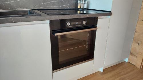 Apartmán C2 Hrabušiceにあるキッチンまたは簡易キッチン
