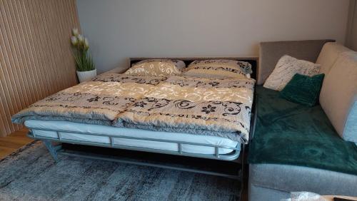 Apartmán C2 Hrabušiceにあるベッド