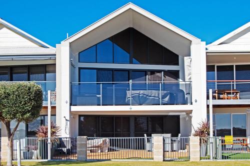 a house with a balcony with a view at Lesueur Days in Jurien Bay