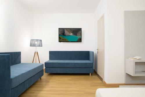 Posezení v ubytování Lu' Hotel Porto Pino
