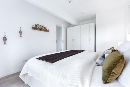 Un pat sau paturi într-o cameră la Grünwald