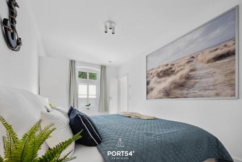 Кровать или кровати в номере Ferienwohnung Vogelsang, App 5 Emmelsbüll