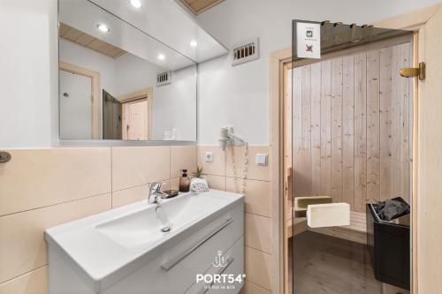 Phòng tắm tại Ferienhaus Strandmuschel Marina Wendtorf