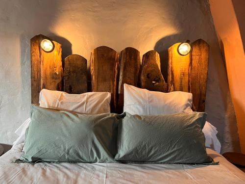 Ein Bett oder Betten in einem Zimmer der Unterkunft Gite de l'Oeil