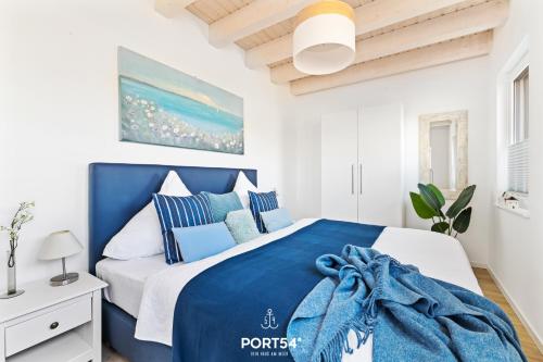 Postel nebo postele na pokoji v ubytování Haus Blaue Blume
