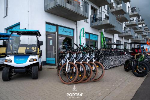 a group of bikes parked in front of a building at Harbour House in Olpenitz