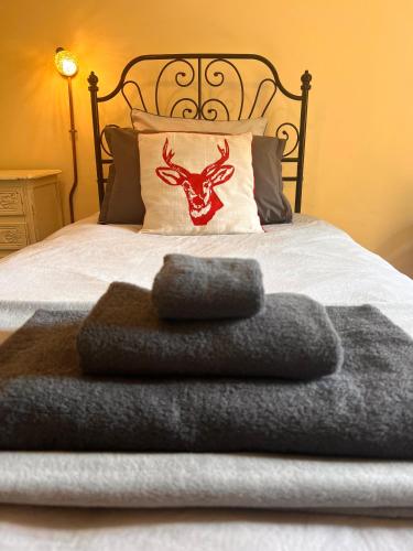 Ein Bett oder Betten in einem Zimmer der Unterkunft Gite de l'Oeil