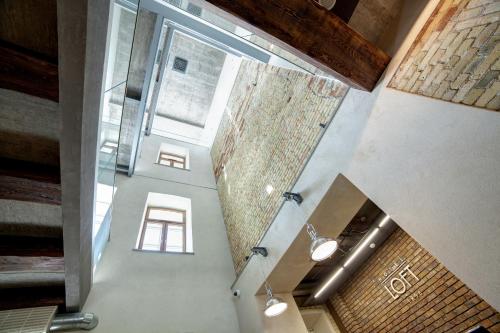 a view from the top of a building with a window at Hotel Loft 1898 in Suwałki