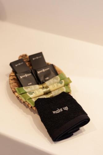 a pile of cell phones sitting on top of a table at Sunset Hill Suites in Mýkonos City