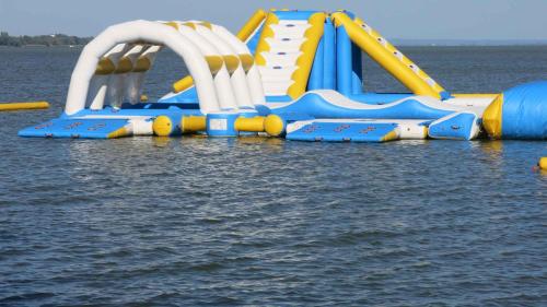 a water slide in the middle of the water at Apartment Keszthely 9 in Keszthely