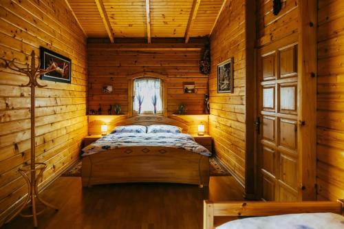 Un pat sau paturi într-o cameră la Ferienhaus Entner