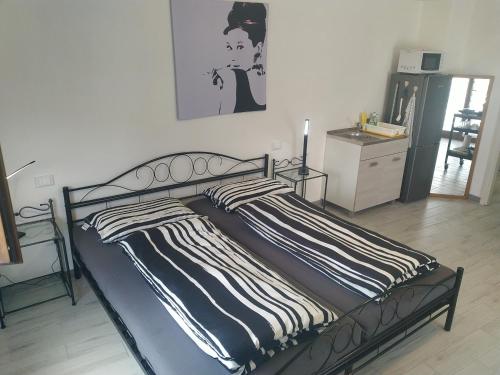 Кровать или кровати в номере Casa Doris