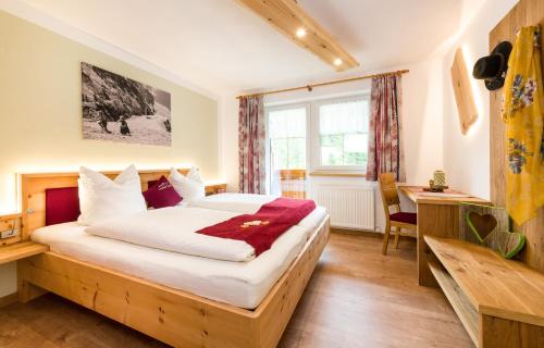Postel nebo postele na pokoji v ubytování Landhaus Pichler
