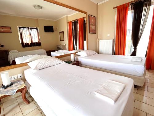 Ένα ή περισσότερα κρεβάτια σε δωμάτιο στο Bay Holiday Hotel & Spa