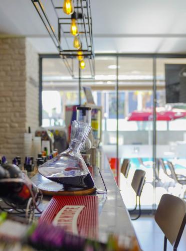 a glass timer sitting on top of a counter at Laren Family Hotel & Spa - Boutique Class in Antalya