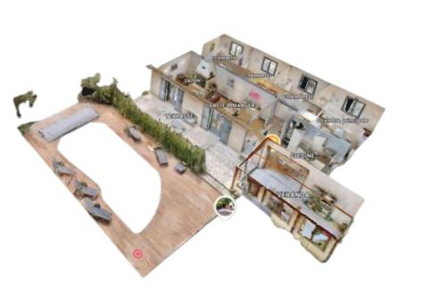 un montage d'un bâtiment avec une patinoire dans l'établissement Charmante maison avec parc arboré & piscine au sel, à Saint-Laurent-des-Hommes