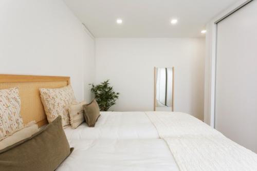 Voodi või voodid majutusasutuse Nōhō house toas