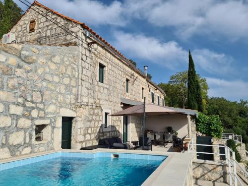 Foto Amber's Place: cosy house with pool and sea views 4