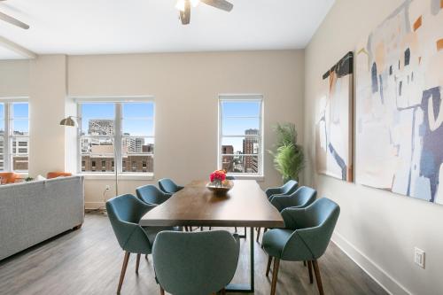 a dining room with a table and chairs at Spacious 4B Oasis steps from French Quarter - Your NOLA Dream Awaits! in New Orleans
