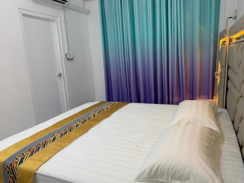 Кровать или кровати в номере Ontrack Travel - room