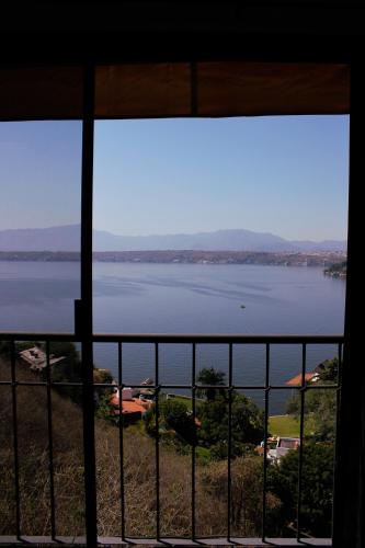 a view of a large body of water from a window at Yauik in Tequesquitengo
