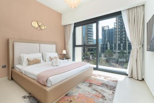 Postel nebo postele na pokoji v ubytování Lux BnB Act-1 Tower I Boulevard Views