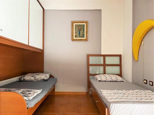 Llit o llits en una habitació de Zenit days