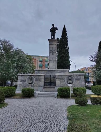 a statue of a man on top of a monument at HOTEL KREDO in Sliven