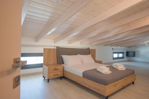 Postel nebo postele na pokoji v ubytování Villa Olia