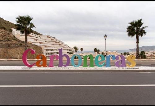 a sign that says congratulations on the side of a road at Ático los cocones in Carboneras