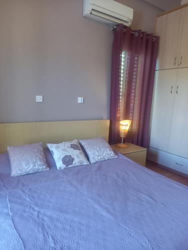 Postel nebo postele na pokoji v ubytování Villa Koumneni