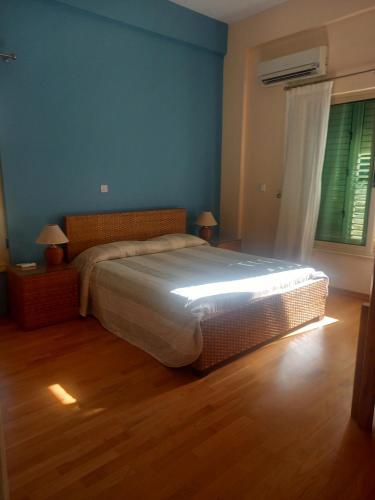 Postel nebo postele na pokoji v ubytování Villa Koumneni