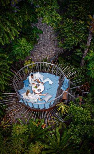 an overhead view of people sitting around a table at Nay Palad Hideaway - All Inclusive Stay in General Luna