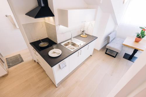 Residence Martinelliにあるキッチンまたは簡易キッチン