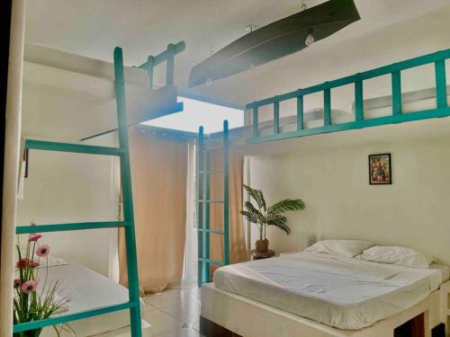 En eller flere senge i et værelse på Casa Apolonia