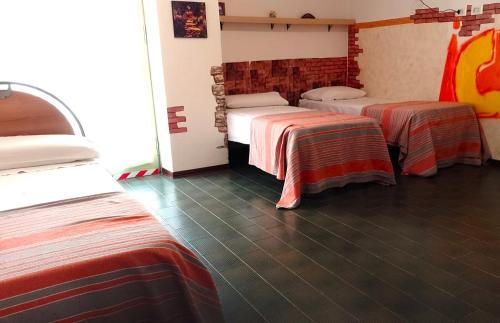 Postel nebo postele na pokoji v ubytování Cozy!! Verona