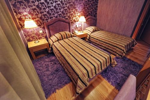 Haikos Hotelにあるベッド