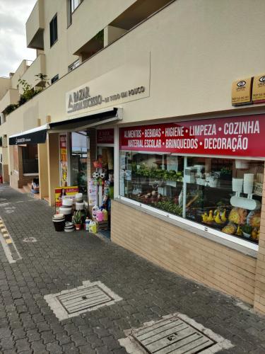 a store front of a store with fruits and vegetables at Funchal Apartments - New Botanic Garden Petit Studios in Funchal