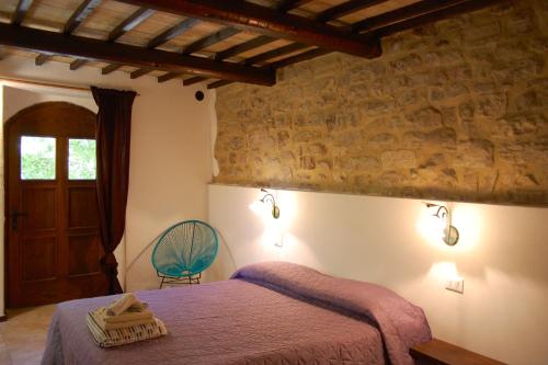 Postel nebo postele na pokoji v ubytování Agriturismo Paradiso41