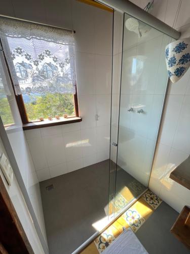 Ванная комната в Chalés Vista das Montanhas