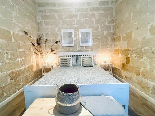 Ένα ή περισσότερα κρεβάτια σε δωμάτιο στο Wanderlust Beach Apartment