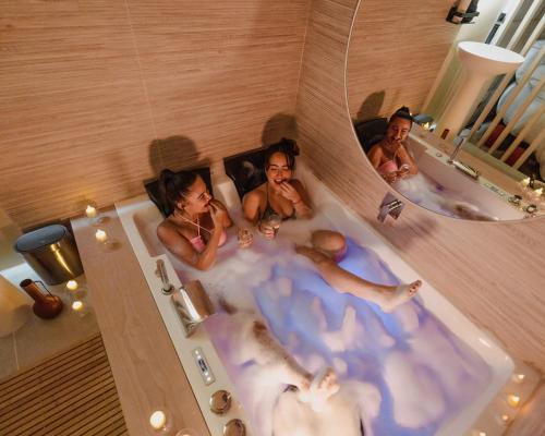 a group of people in a bath tub at DISNEY MOOD BY WELOVEYOU® in Bailly-Romainvilliers