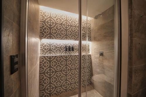 Ein Badezimmer in der Unterkunft Ontico Urban Design Hotel